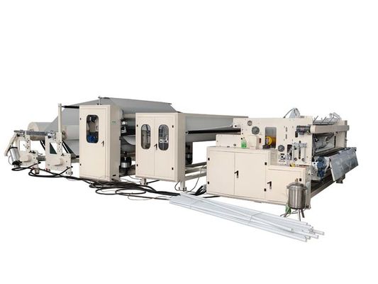 Macchina automatica per il rimbocco di carta igienica con laminazione adesiva